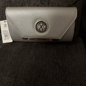 Chic Silver Clutch by [Brand]